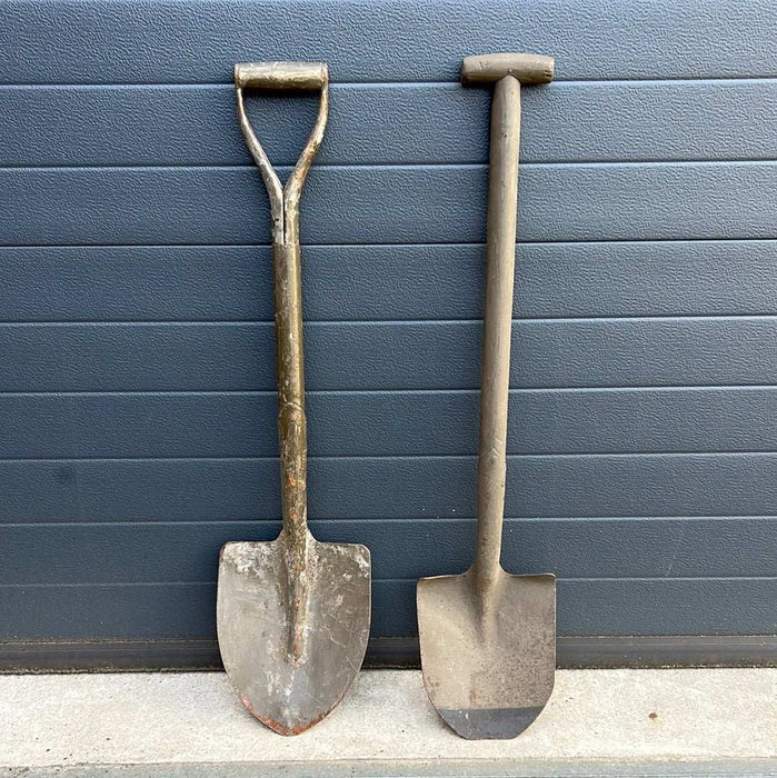 Shovel with potential light damage due to age. Shovel with potential light damage due to age.