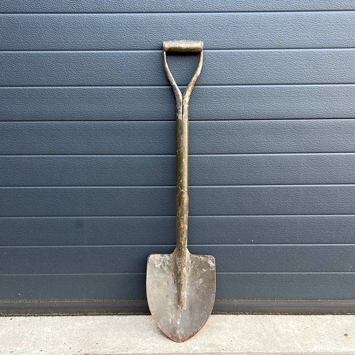 Shovel with potential light damage due to age. Shovel with potential light damage due to age.