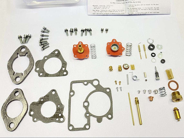 Reparatieset carburateur rebuild-kit with screws and components in packaging.